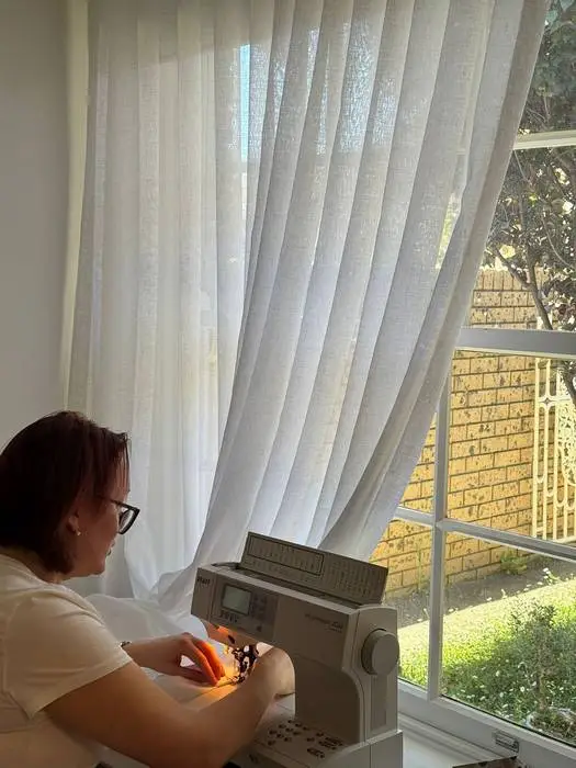 Precise sewing of lightweight linen curtains for an S-Fold installation