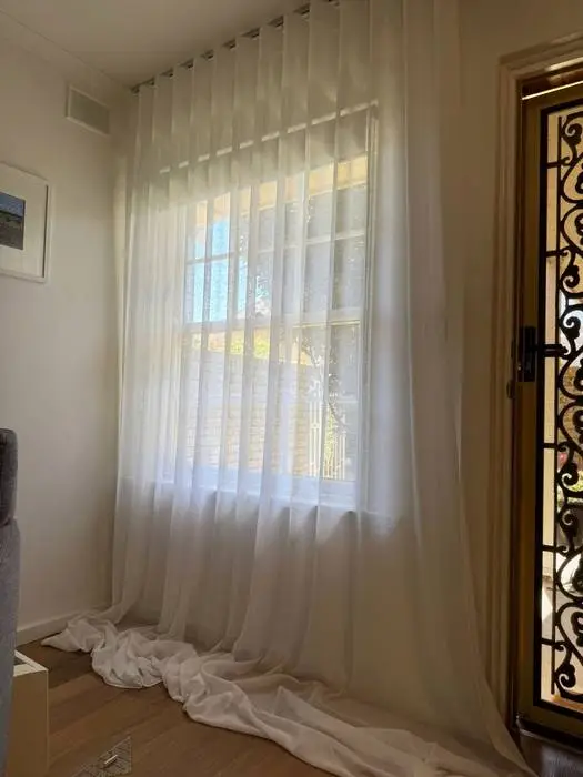 S-Fold linen curtains hanging before final on-site hem adjustment