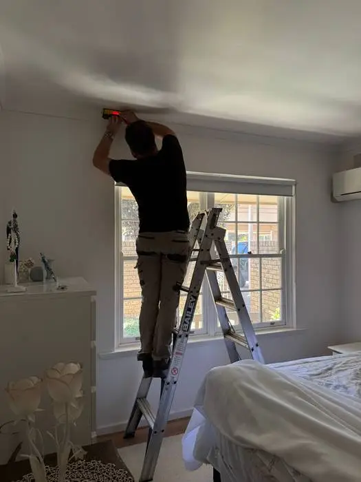 Measuring curtain height for custom S-Fold curtains in an Adelaide bedroom